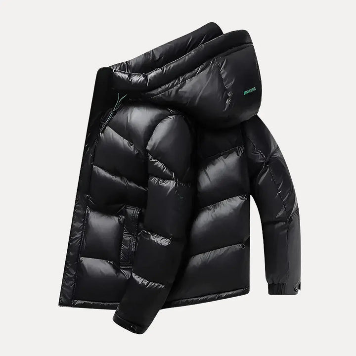 Comfortable men's insulated quilted jacket with hood, ideal winter outerwear for cold weather.