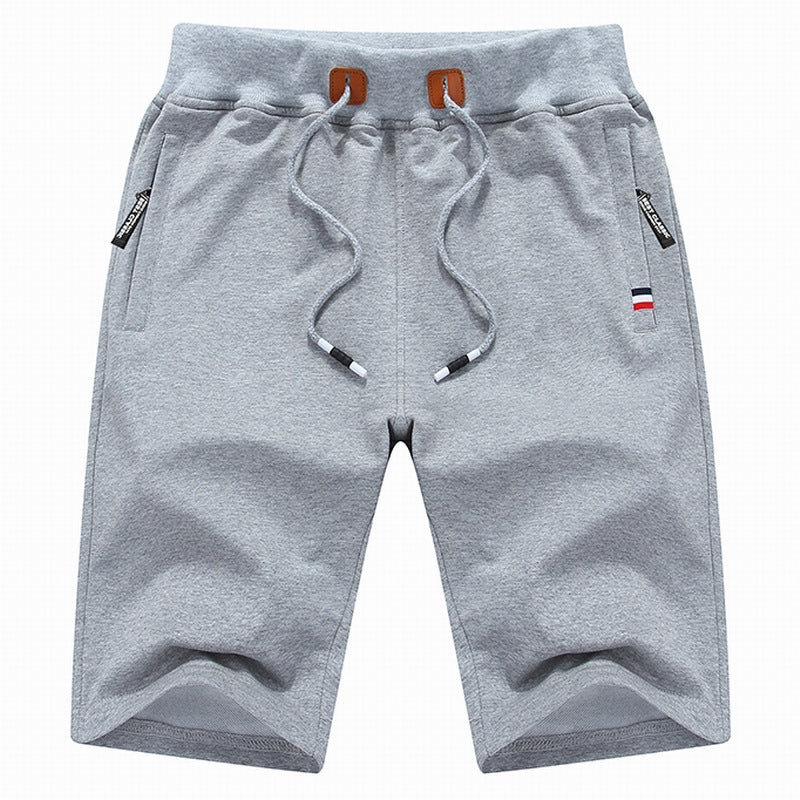 Versatile men's relaxed fit drawstring shorts, comfortable for summer, gym, or casual outings.