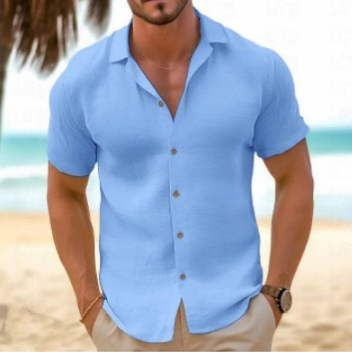 Stylish men's short sleeve shirt featuring a relaxed collar. Casual and comfortable for summer leisure.
