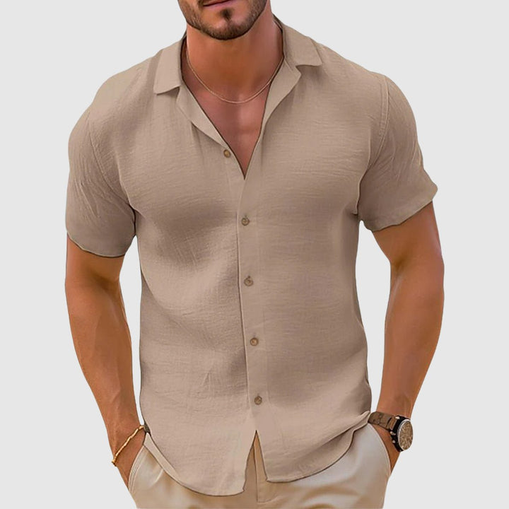 Relaxed fit men's short sleeve shirt with a stylish collar. Ideal for warm weather leisure & travel.