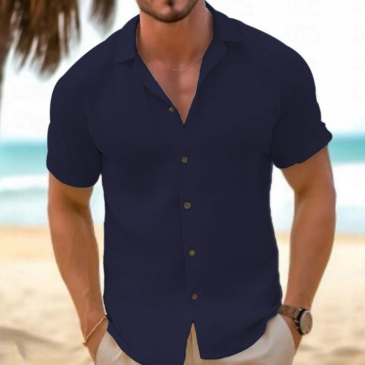 Travel-friendly men's relaxed collar short sleeve shirt. Casual, comfortable, perfect for warm weather trips.