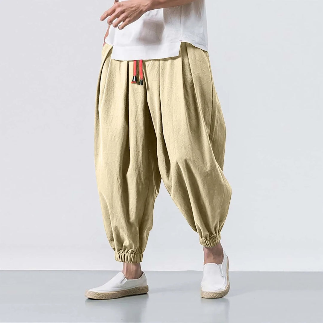 Soft, breathable men's baggy harem jogger pants, offering relaxed fit & comfort for lounge & active wear.