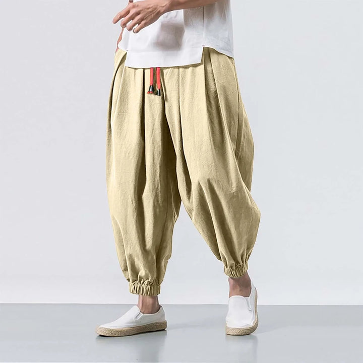 Soft, breathable men's baggy harem jogger pants, offering relaxed fit & comfort for lounge & active wear.