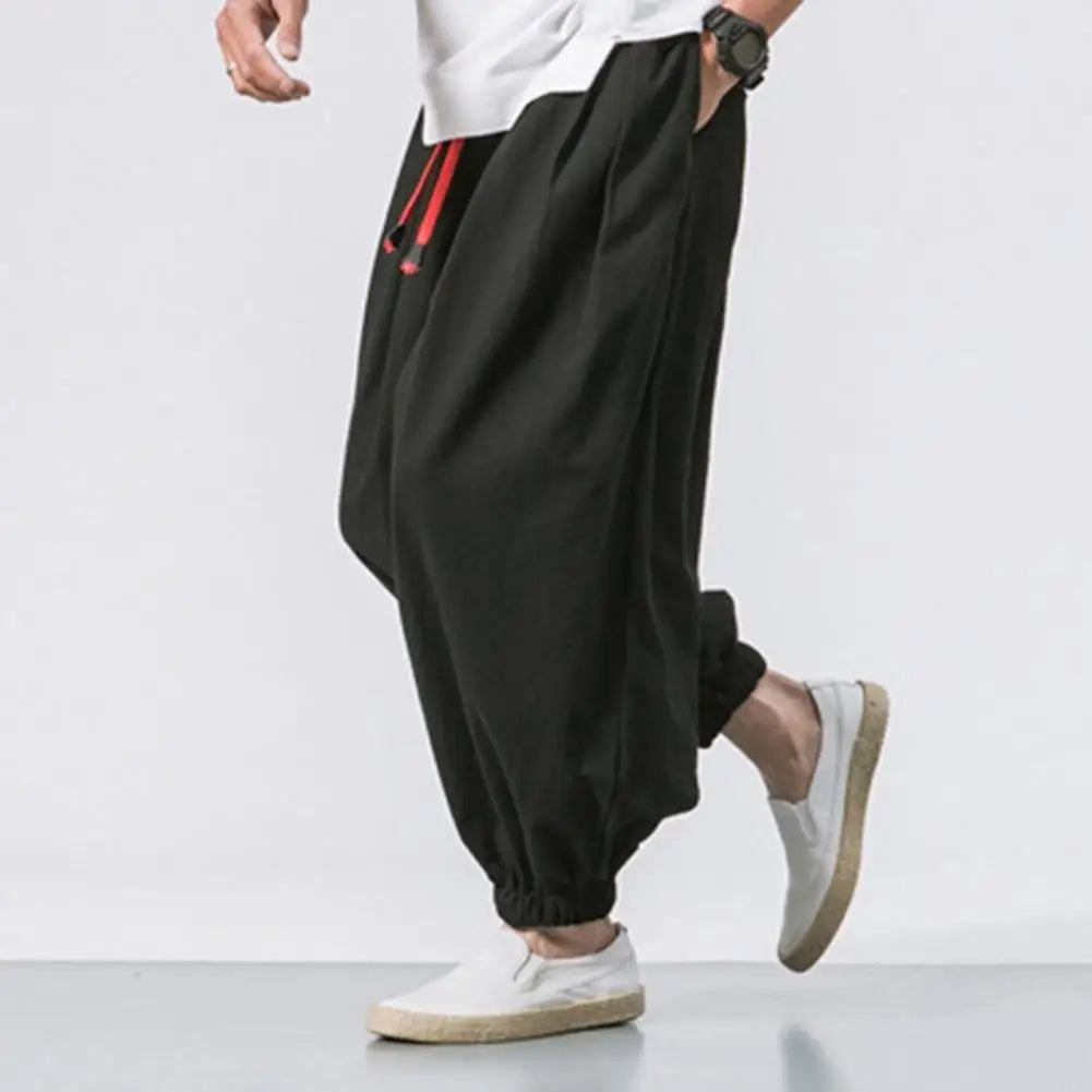 Stylish men's relaxed fit joggers, providing a modern baggy harem pant look for ultimate casual comfort.