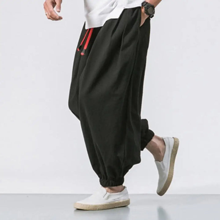 Stylish men's relaxed fit joggers, providing a modern baggy harem pant look for ultimate casual comfort.