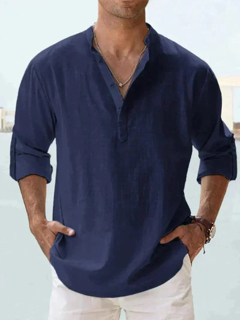 Relaxed fit men's long-sleeve summer button-down shirt. Perfect for casual, warm weather style.