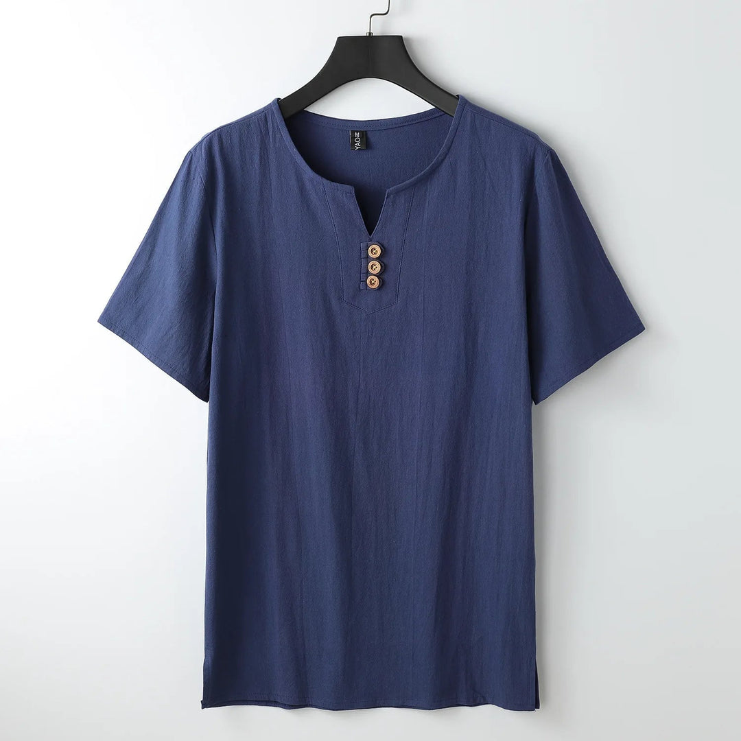 Men's relaxed fit button-neck t-shirt for effortless casual style & everyday comfort. Short sleeve basic tee.