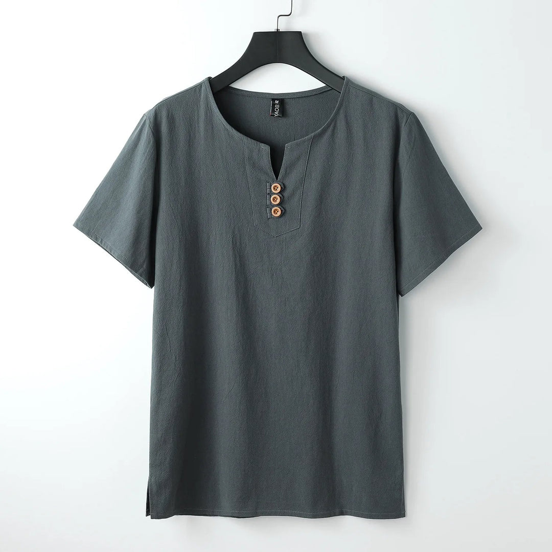 Men's relaxed fit t-shirt with a stylish button-neck detail. Versatile short sleeve basic for casual everyday outfits.