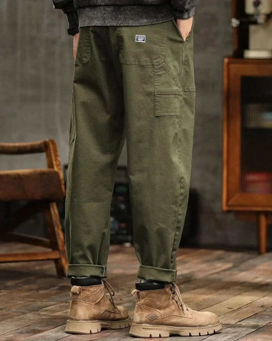 Rugged men's multi-pocket cargo pants, perfect for outdoor activities & utility needs.