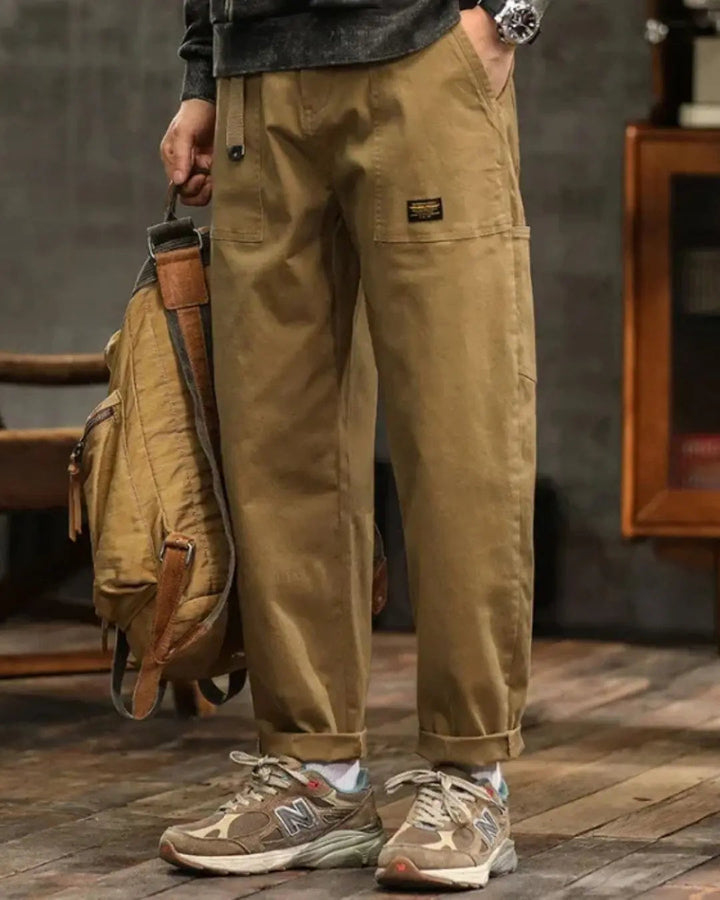 Comfortable men's relaxed fit olive green cargo pants, great for casual style.