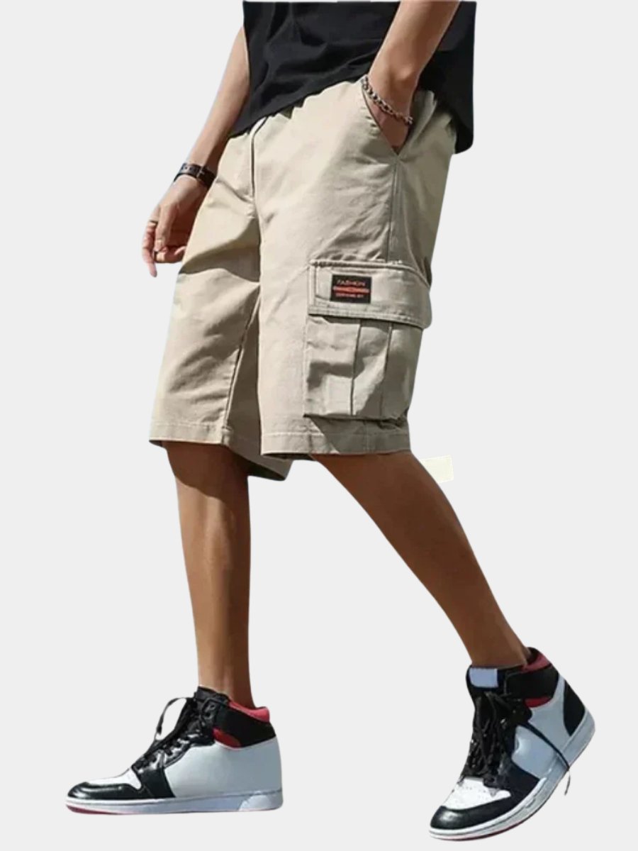 Men's relaxed fit cargo shorts, perfect for summer casual wear. Comfortable drawstring waist.
