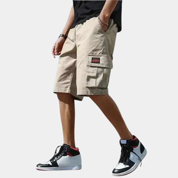 Durable men's cargo shorts with multiple pockets, ideal for outdoor adventures and travel.