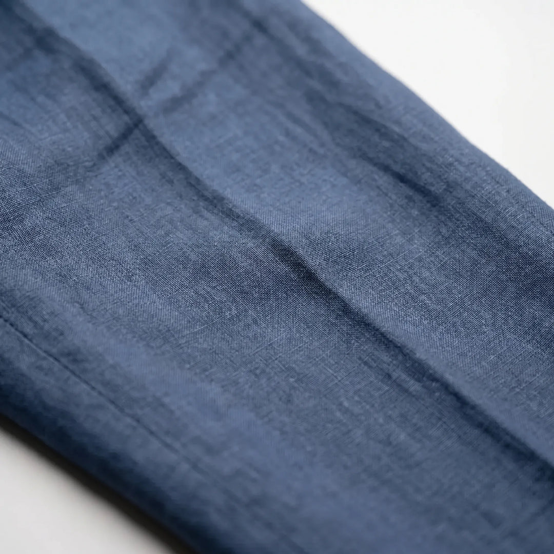 Comfortable men's relaxed fit pants with button fly, versatile for office or casual use.
