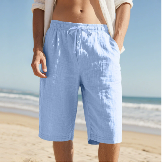 Comfortable men's relaxed fit chino shorts featuring an adjustable drawstring waist for casual apparel.
