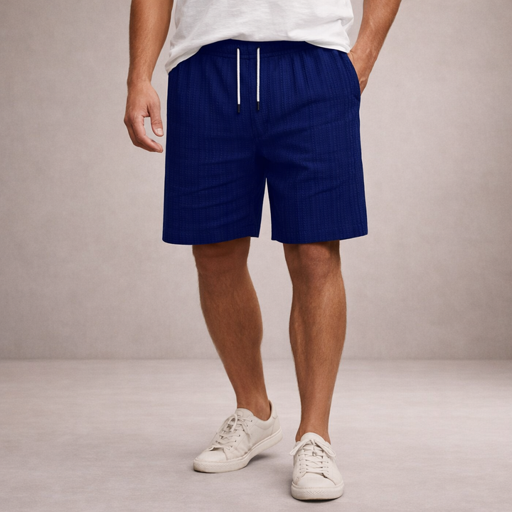 Stylish men's relaxed fit drawstring summer shorts with subtle stripe detail for casual wear.
