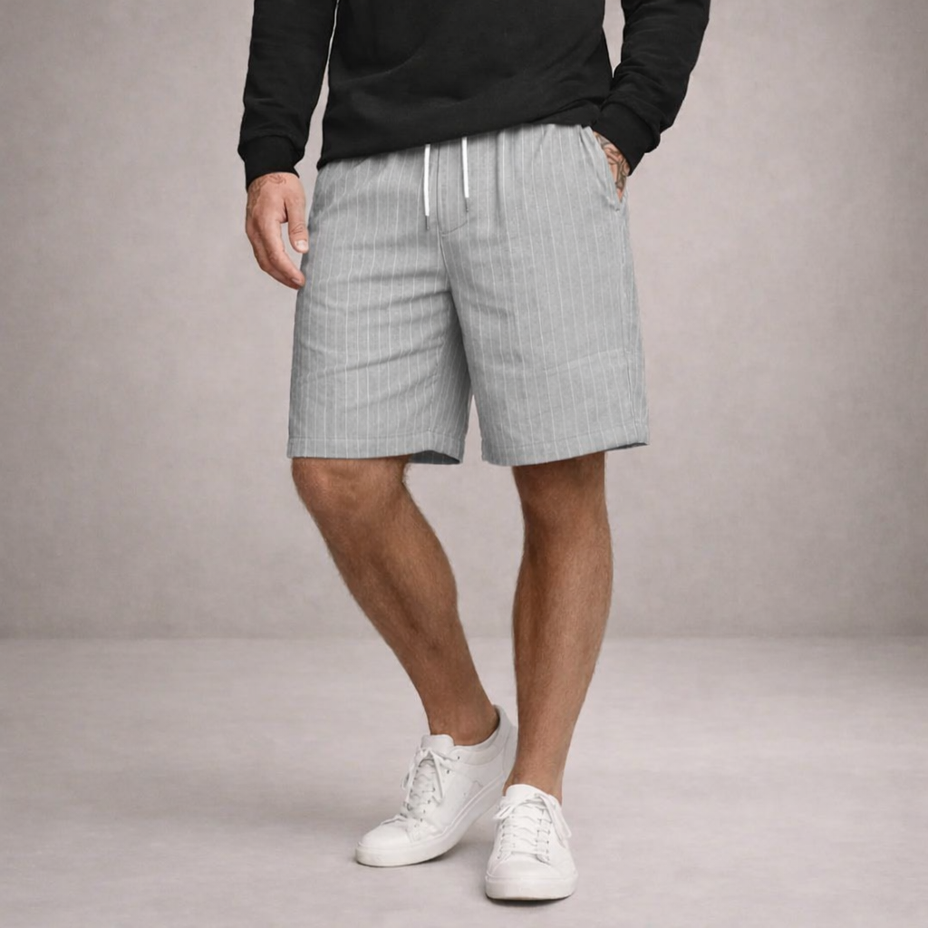 Close-up of men's relaxed fit summer shorts, highlighting the adjustable drawstring and soft fabric.