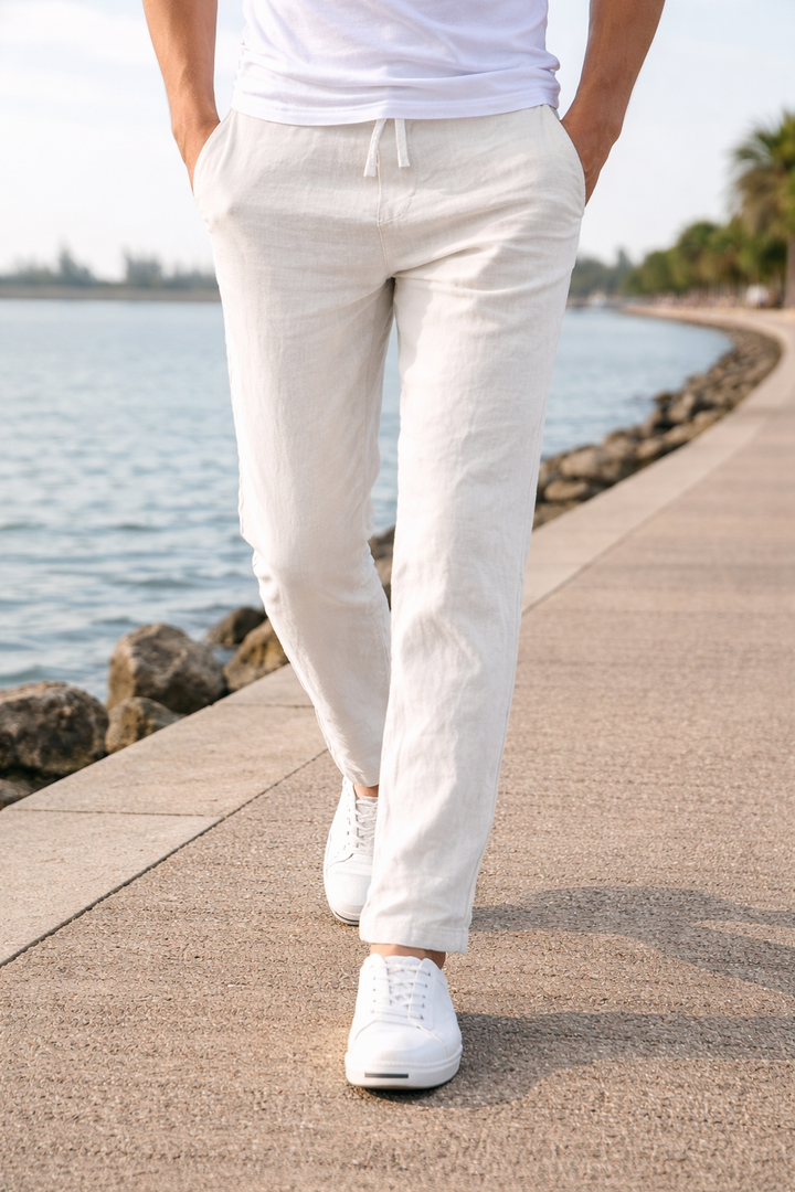 Men's Relaxed Fit Drawstring Trousers, featuring a straight leg & elastic waist.