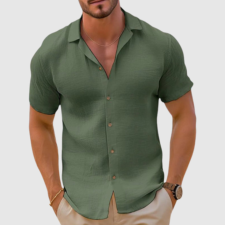 Lightweight men's linen shirt. Relaxed fit, long-sleeve button-down, perfect for casual summer and beach outfits.