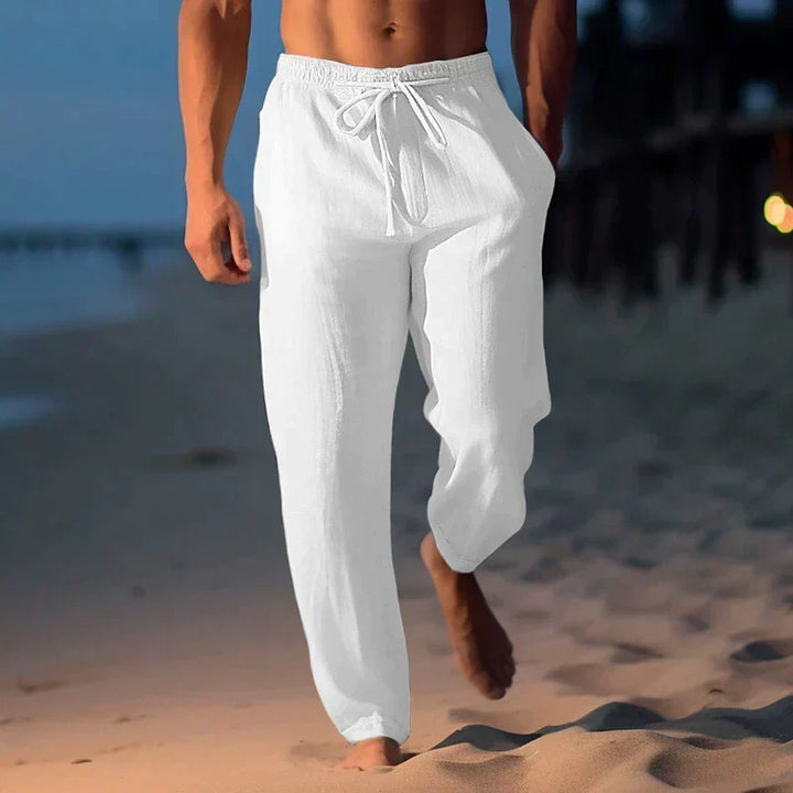 Stylish men's casual linen pants with drawstring, offering a relaxed fit for summer, beach, or vacation wear.
