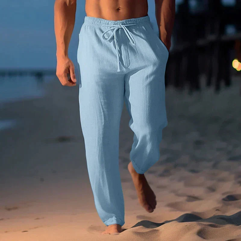 Comfortable men's drawstring linen pants, relaxed fit, excellent for breathable summer fashion & travel.