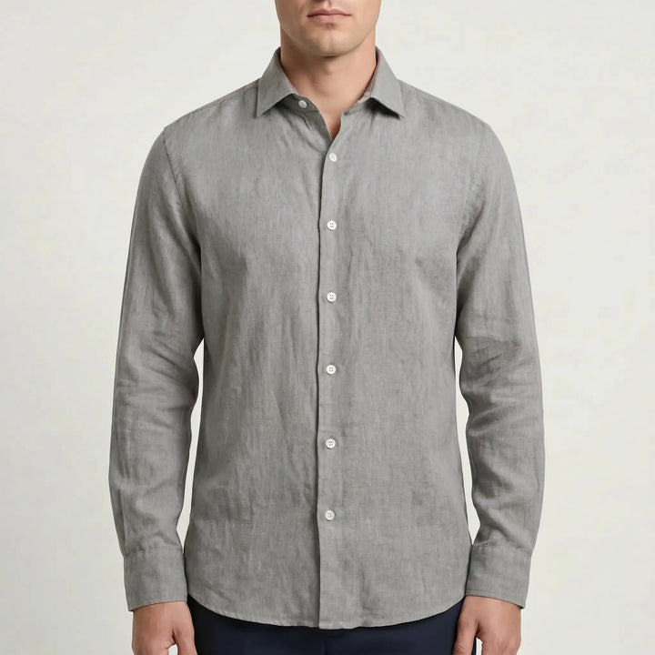 Modern men's relaxed fit long-sleeve button-up shirt. Breathable & comfortable for casual summer fashion.