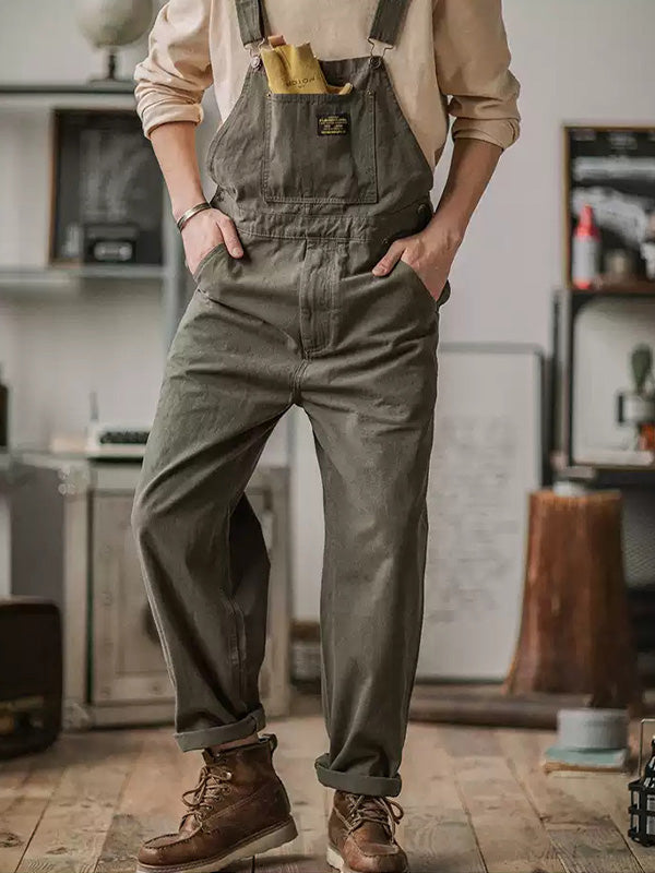 Khaki men's relaxed fit bib overalls, full length for comfortable everyday fashion and casual style.