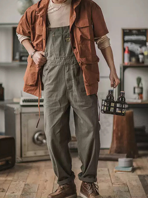 Stylish khaki men's relaxed fit overalls with adjustable straps, perfect for comfortable men's fashion.
