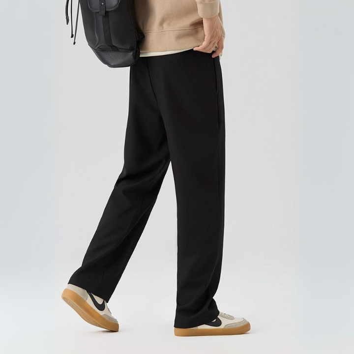 Lightweight men's relaxed fit pleated dress trousers, classic style for all-day comfort & elegance.