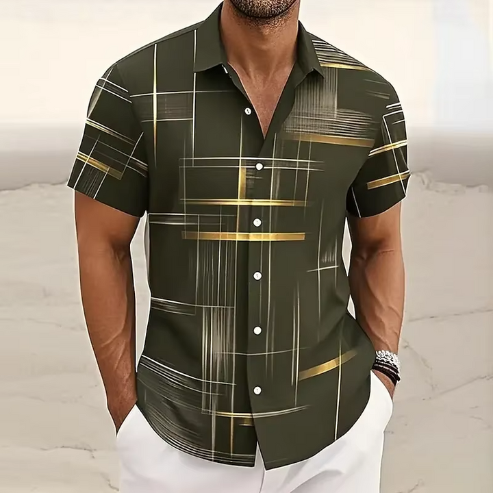 Men's short-sleeve polo with intricate geometric pattern, relaxed fit, and contemporary camp collar.