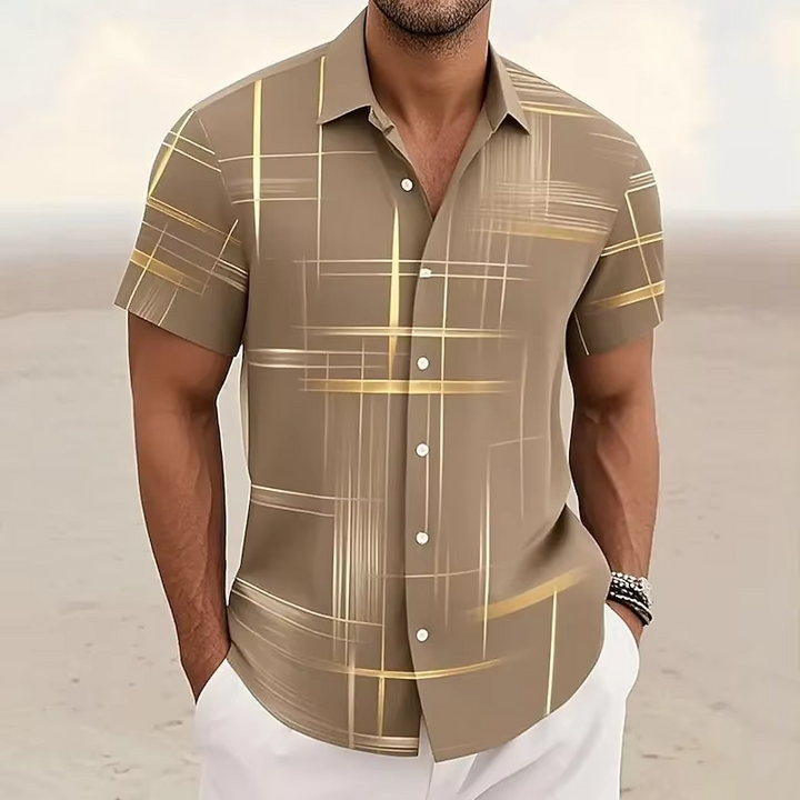 Stylish men's short-sleeve polo. Features a contemporary geometric print and relaxed fit for modern fashion.