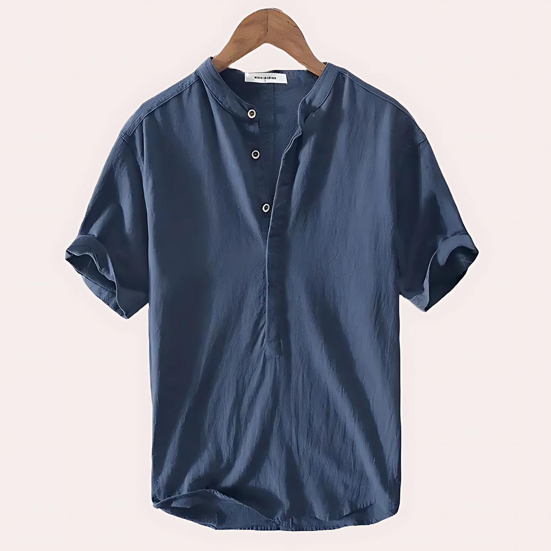 Versatile men's relaxed fit Henley tee with short sleeves & button placket. Great for smart casual or daily comfort.