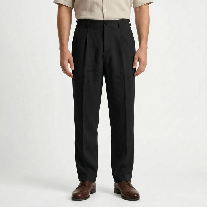 Close-up of comfortable men's relaxed straight leg pleated trousers fabric. Versatile everyday smart casual pants.