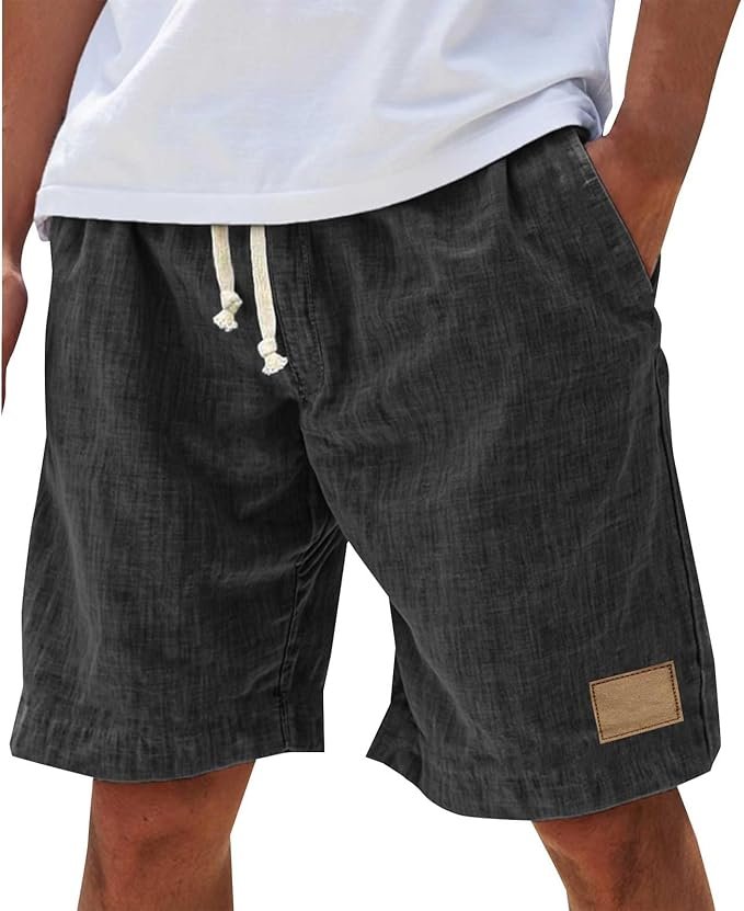 Close-up of men's relaxed fit drawstring shorts, perfect for summer casual comfort & beachwear.
