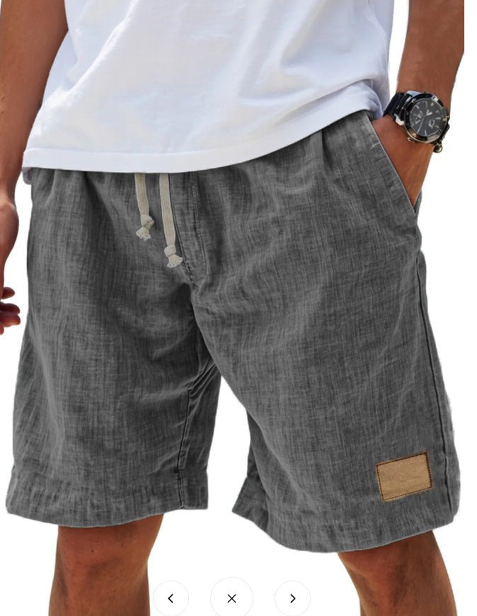 Flat lay of men's relaxed fit summer shorts, a versatile casual bottom for beach or vacation.