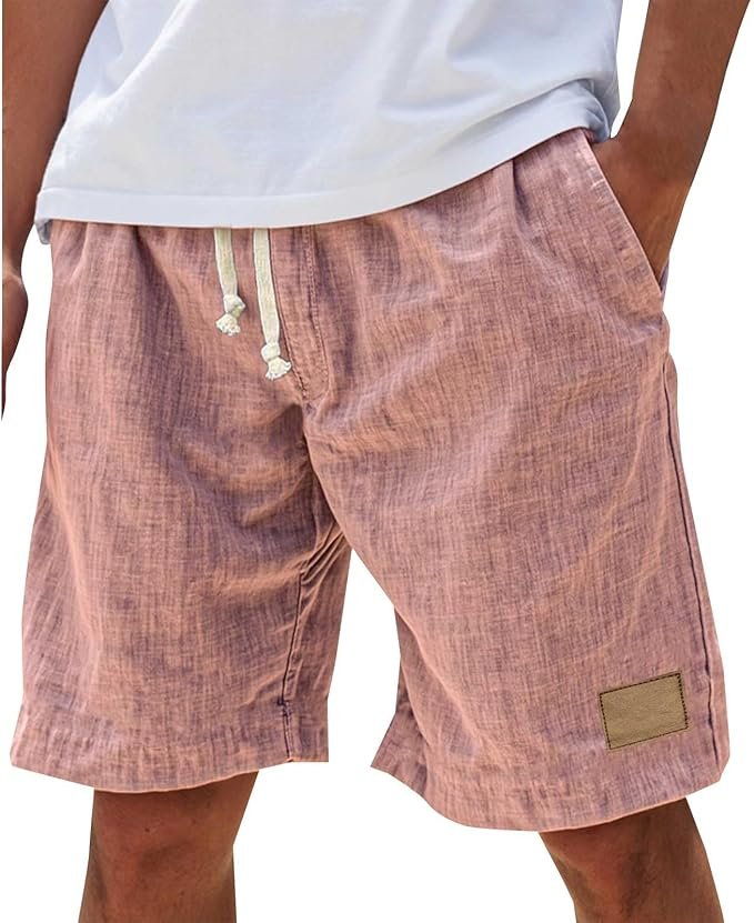 Texture close-up of men's relaxed fit summer shorts fabric, emphasizing comfort & breathability.