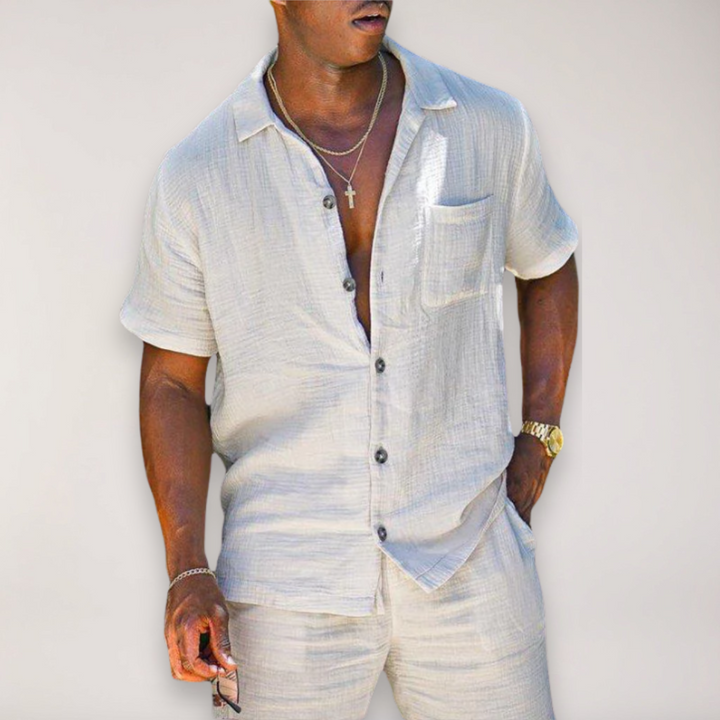 Men's relaxed fit summer two-piece outfit with matching shirt and shorts for casual vacation or beachwear.