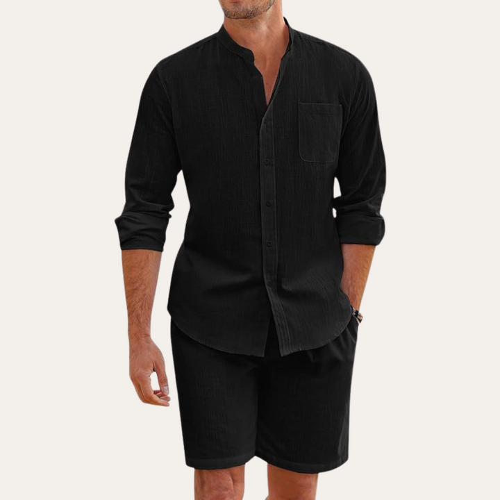 Men's relaxed fit two-piece summer set. Long sleeve shirt & shorts for casual beach or resort wear.