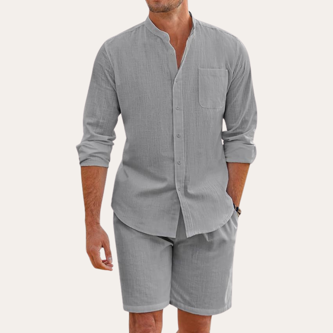 Comfortable men's summer two-piece shirt and shorts set. Relaxed fit for casual wear, beach, or vacation.