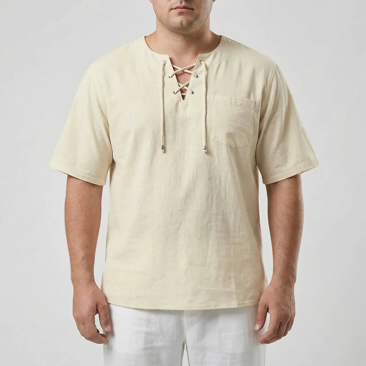 Effortless summer style: men's relaxed fit V-neck pullover top. Loose half-sleeve and comfortable design.