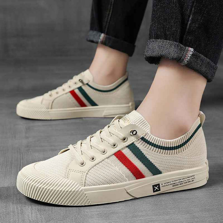 Athletic casual men's trainers with distinctive retro stripes, designed for lightweight comfort all day.