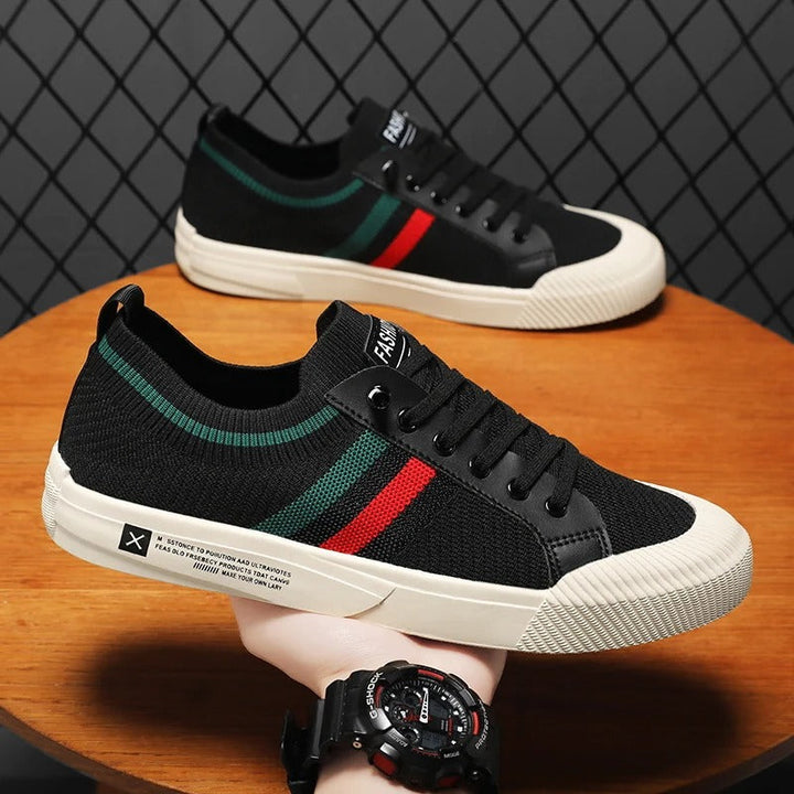 Stylish men's striped sneakers with a retro vibe, great for casual spring and summer fashion looks.