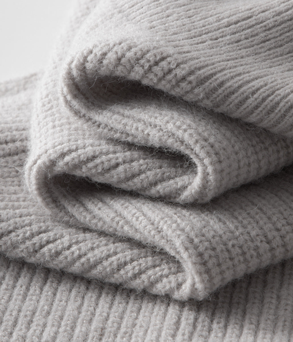 All-season men's ribbed knit jacket. Funnel neck zip-up, great for stylish layering.