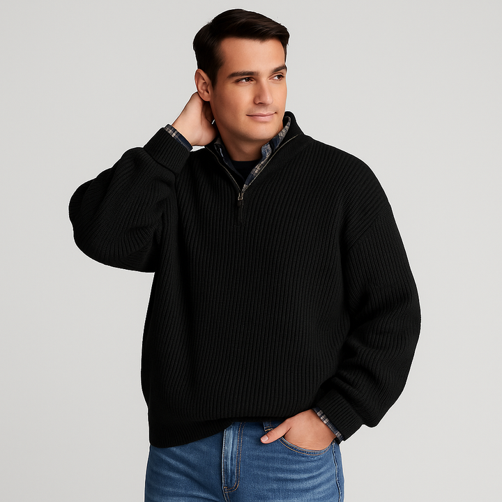 Close-up of men's ribbed half-zip sweater, highlighting soft texture, stand collar, and pullover design.