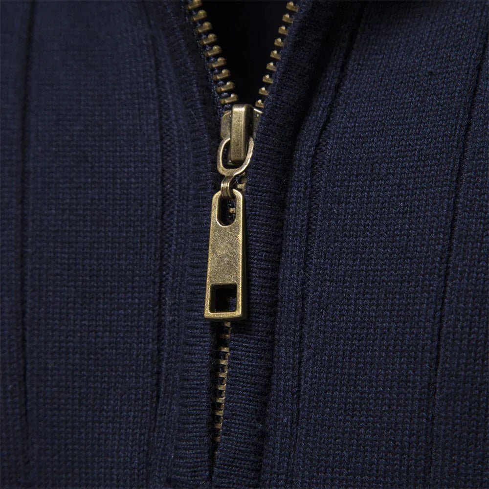 Close-up of men's ribbed mock neck half zip sweater, highlighting texture for business casual & layering.