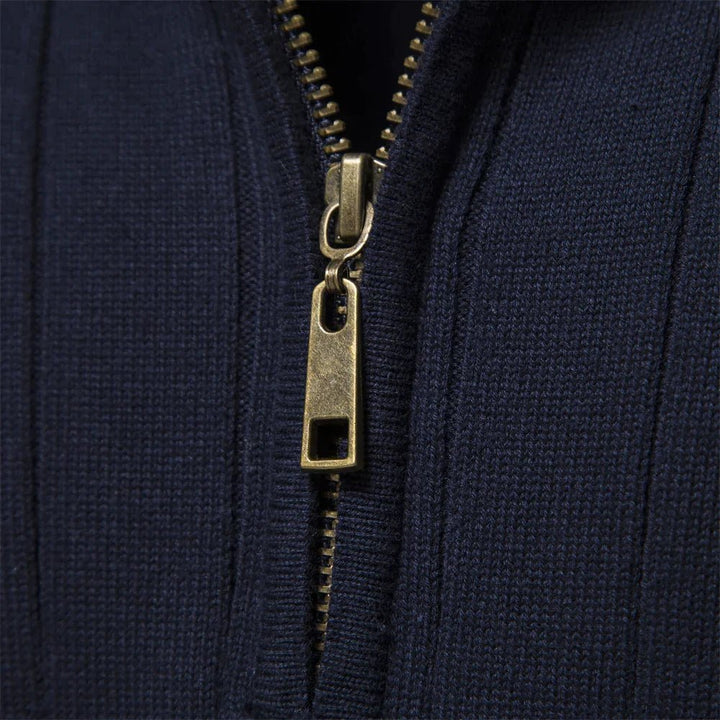 Close-up of men's ribbed mock neck half zip sweater, highlighting texture for business casual & layering.