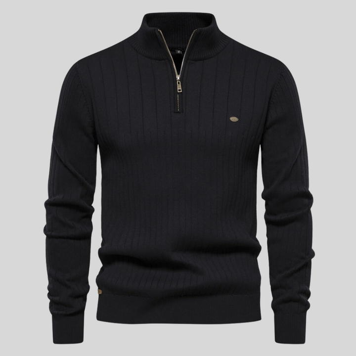 Men's half-zip mock neck sweater with ribbed texture, providing adjustable comfort & ideal for winter layering.