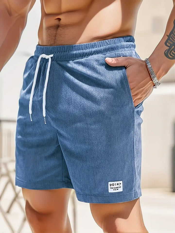 Comfortable men's summer shorts, ribbed texture, elastic waist, drawstring, & side pockets.