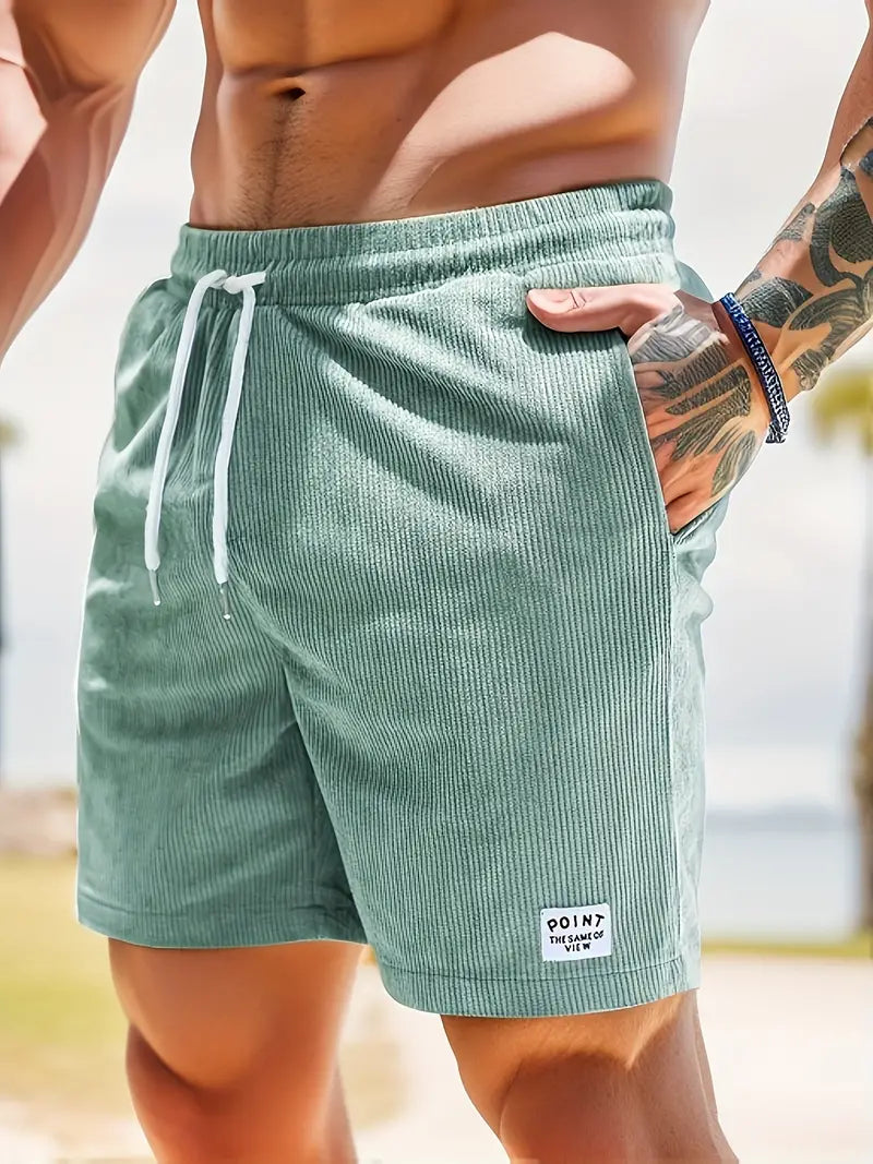 Soft men's beach shorts, ribbed fabric, drawstring waist, and pockets for ultimate summer comfort.