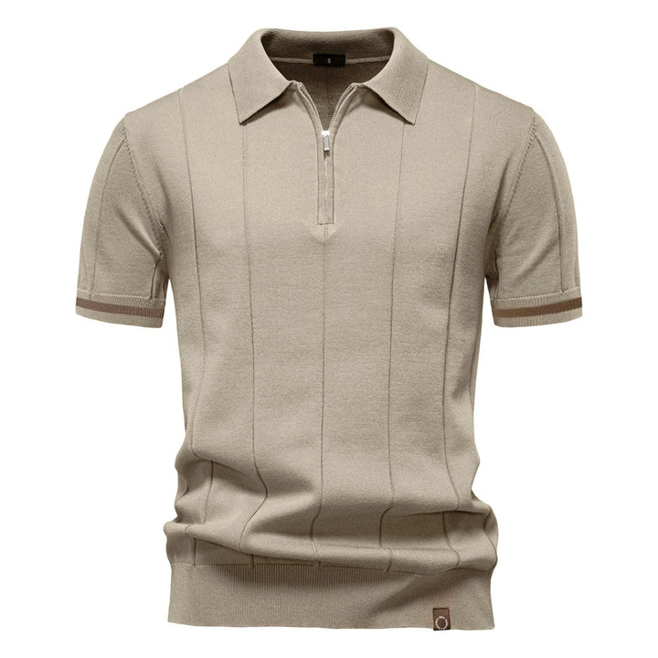Athletic fit men's ribbed zip-neck polo shirt, short sleeve. Stylish and comfortable for smart-casual looks.