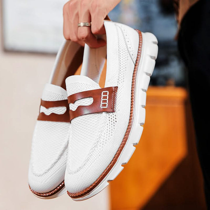 Front angle of men's Ridge loafers, showcasing refined toe design & easy wearability.